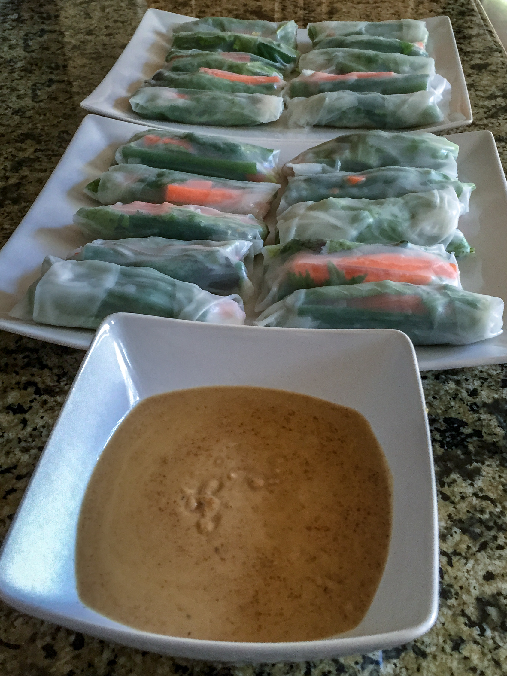 Finished veggie spring rolls and peanut sauce from front