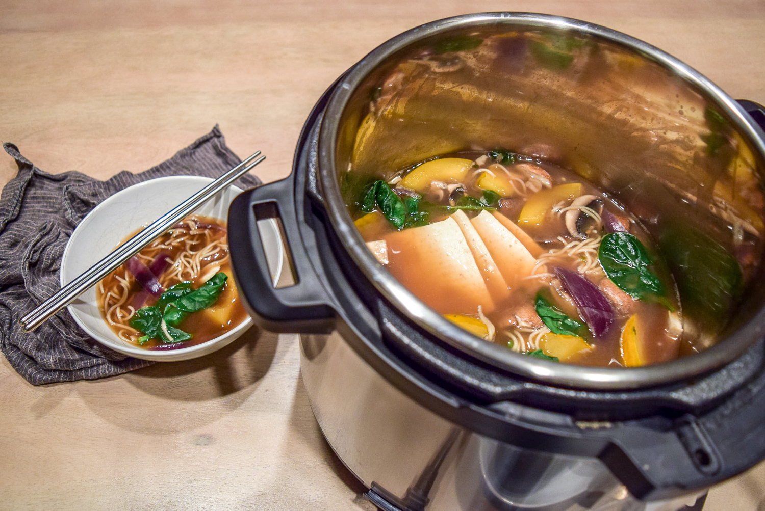 Instant Pot and bowl of Miso Hot Pot with Ramen