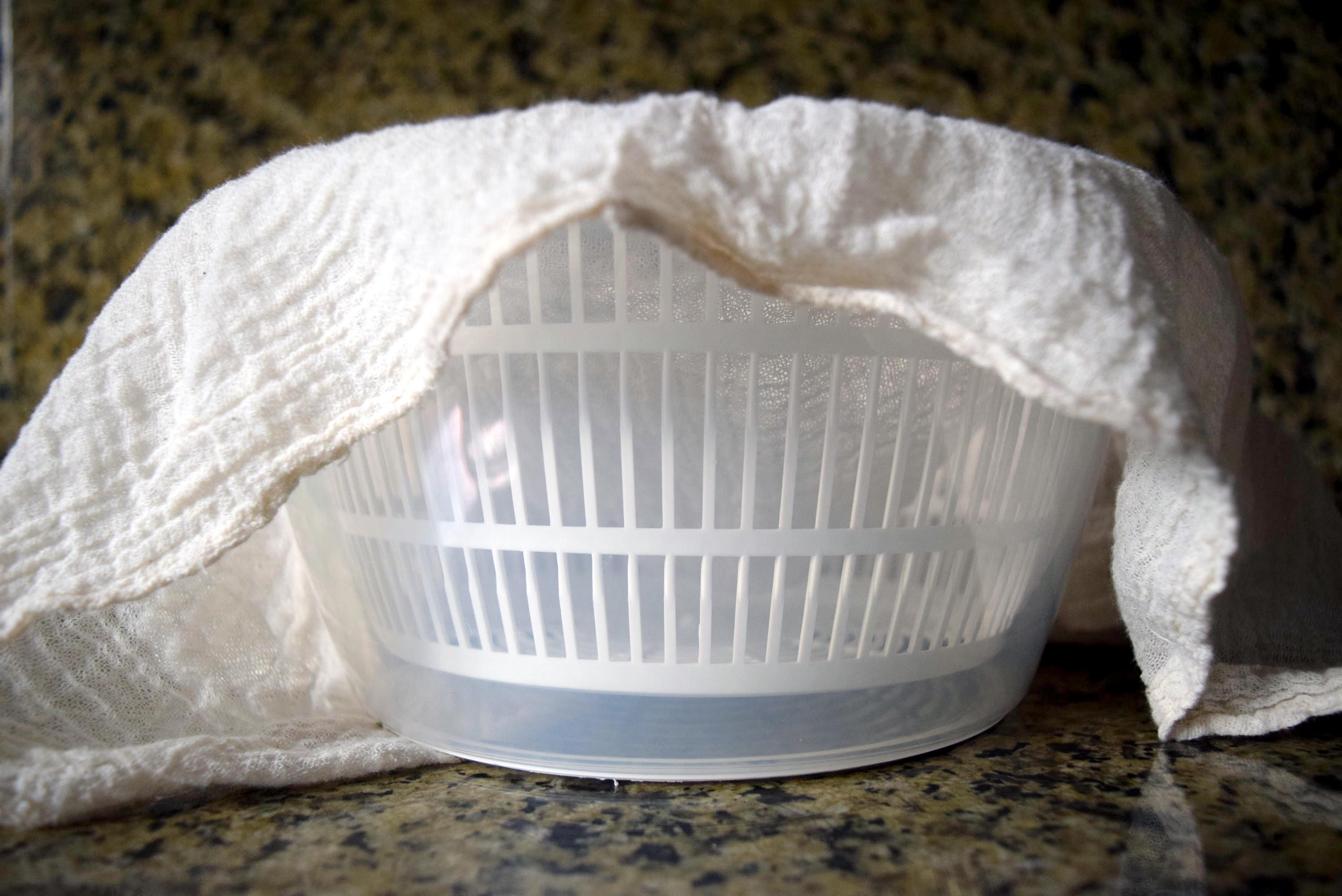 Cheesecloth and IKEA Tokig salad spinner for Homemade Instant Pot Ricotta Cheese from side