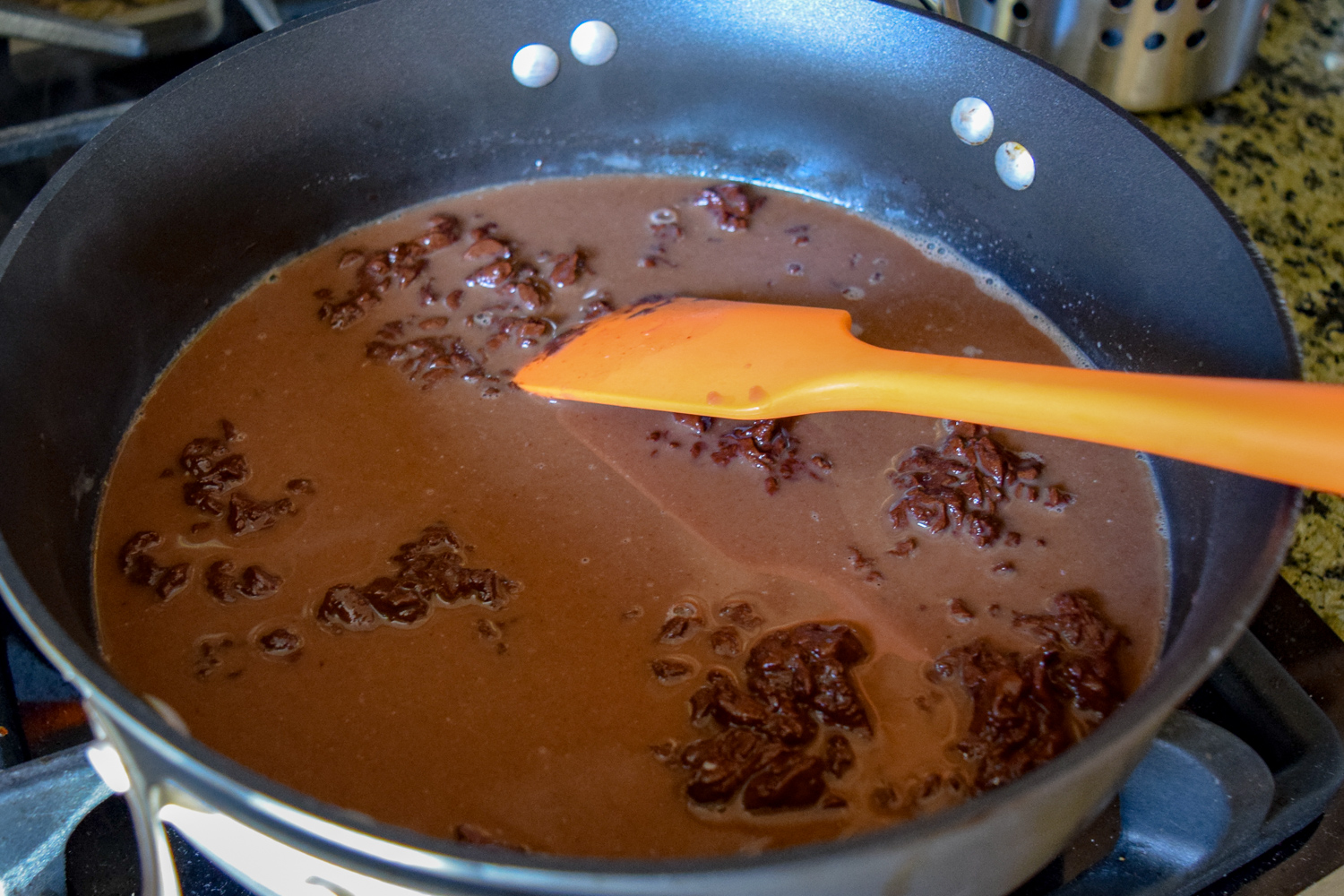 Melting chocolate into the milk in Calphalon sauce pan