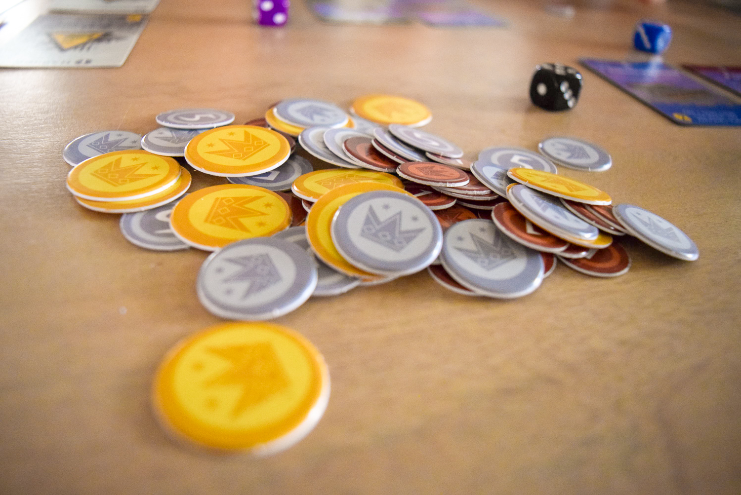 Coins for playing Machi Koro: Bright Lights, Big City 