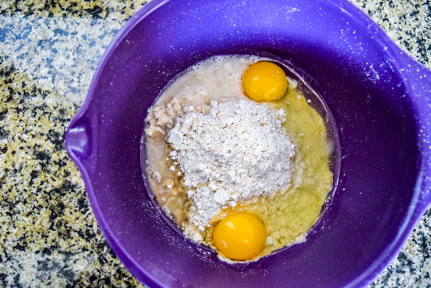 Trader Joe's Multigrain Baking & Pancake Mix, Milk, Canola Oil, and Eggs in KitchenAid Mixing Bowl