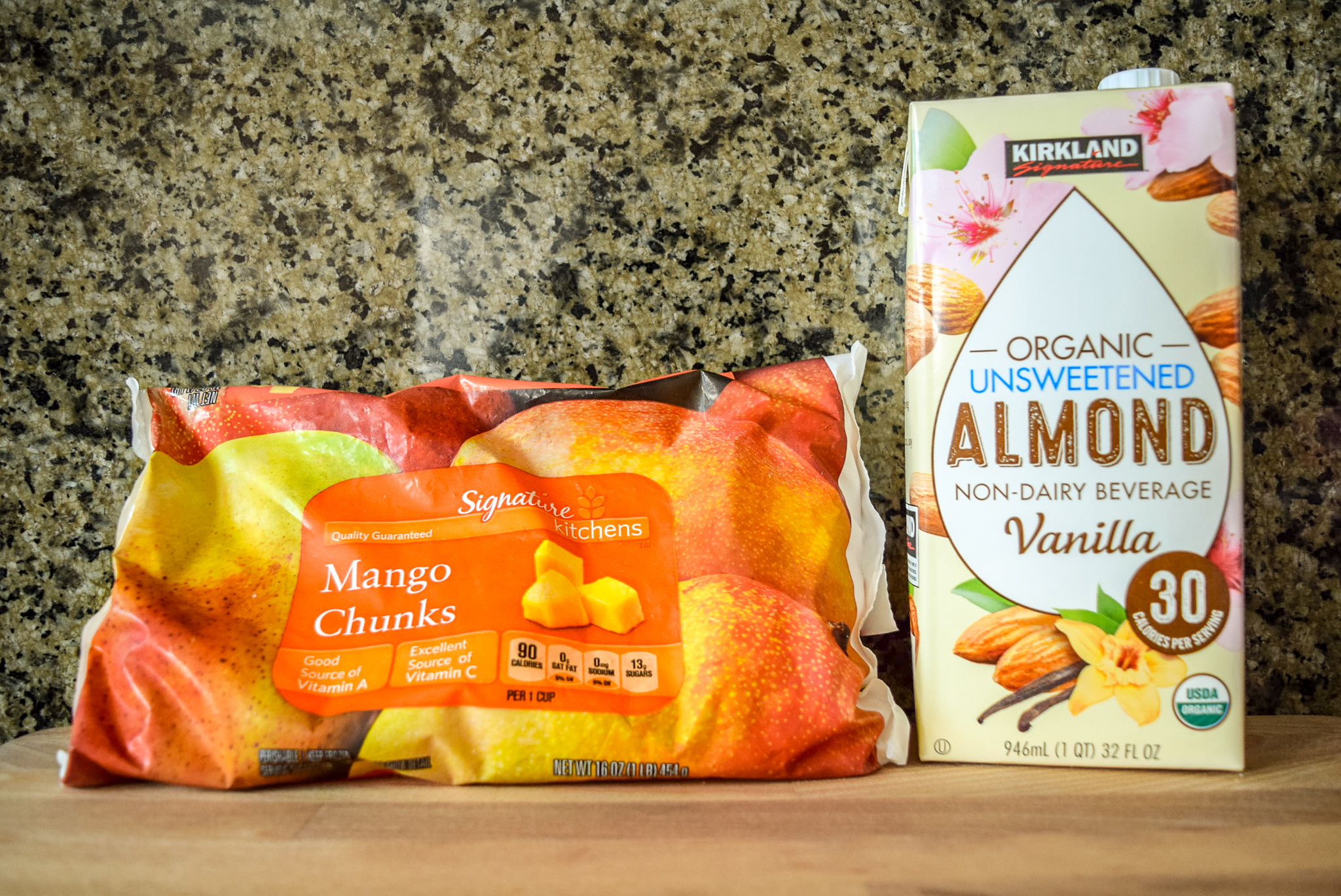 Ingredients for Two-Ingredient Almond Mango Ice Cream: frozen mango chunks and almond milk