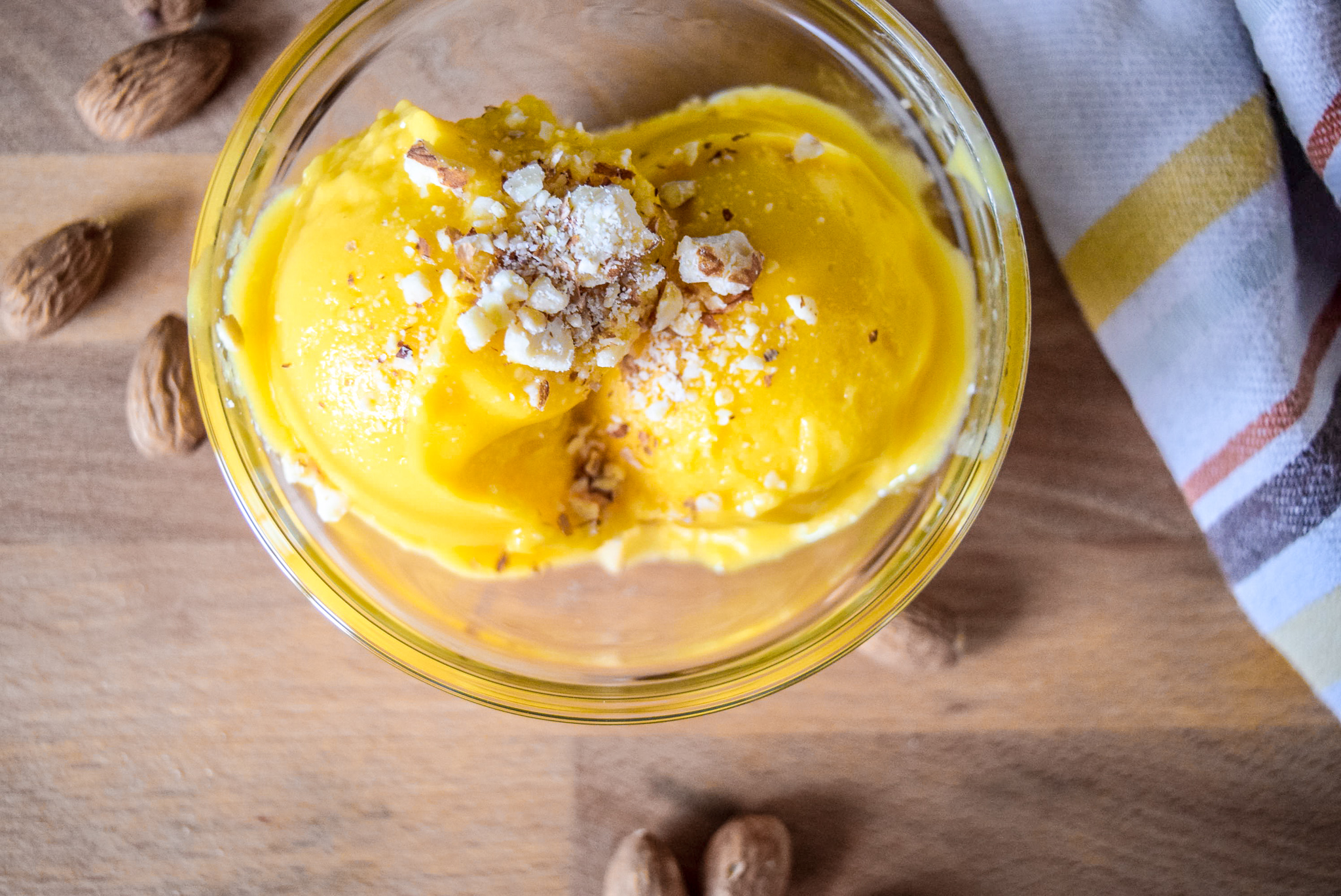 Two scoops of Two-Ingredient Almond Mango Ice Cream from top