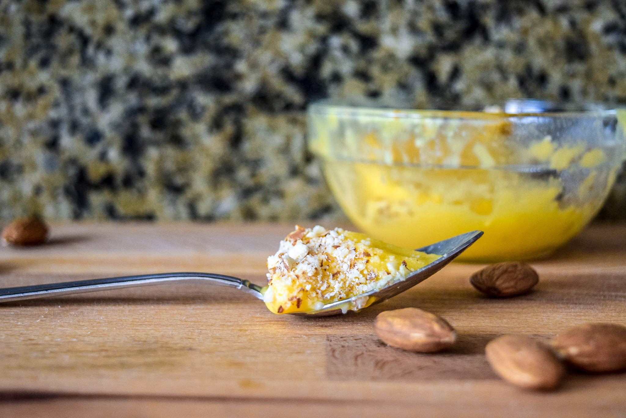 Spoonful of Two-Ingredient Almond Mango Ice Cream from side